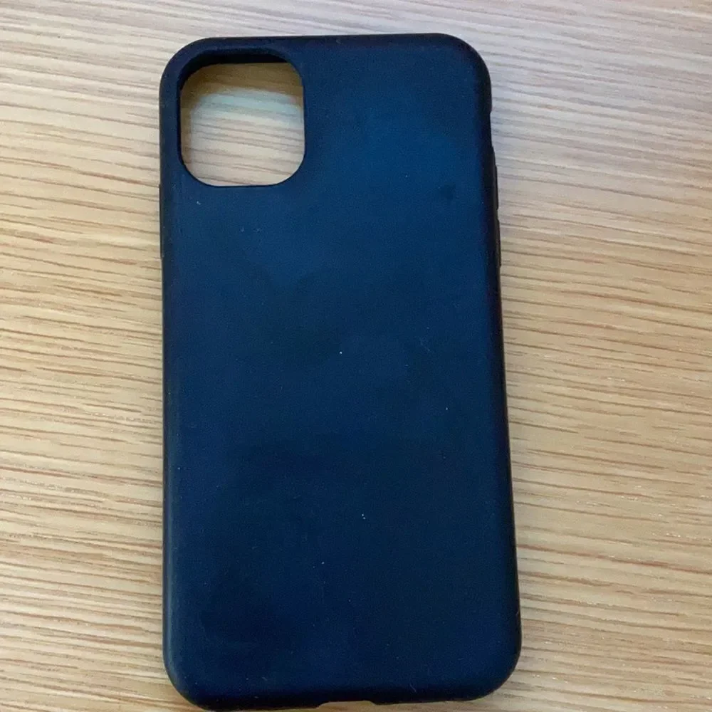 Various IPhone 11 cases including wallflower case